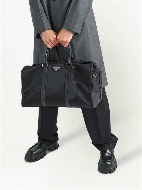 prada triangle duffle bag|prada duffle bag sale.